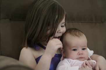 Grace and Isabelle having a cuddle